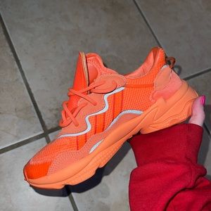 grade school adidas ozweegos- bold orange size 4 1/2 worn once